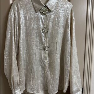 Elegant Cream Blouse with Decorative Brooches